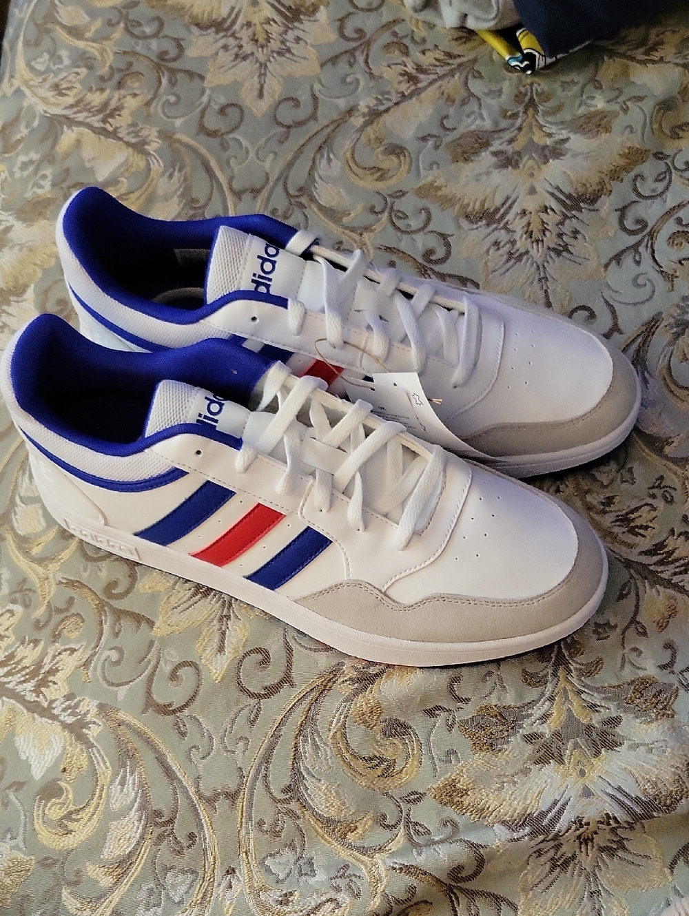 adidas White Sneakers with Blue & Red Stripe Accents